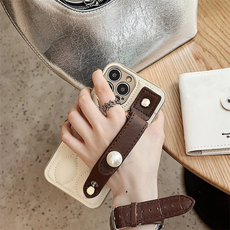 Per iPhone 14 Pro Max Rhombus Texture PU Leather Coated PC Hard Case Back Cover con Faux Pearl Wristband