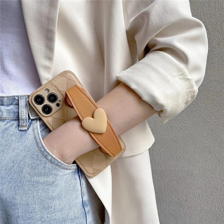 Cellphone Back Shell for iPhone 14 Pro, Rhombus Imprinted PU Leather Coated PC+TPU Phone Cover with Love Heart Wristband