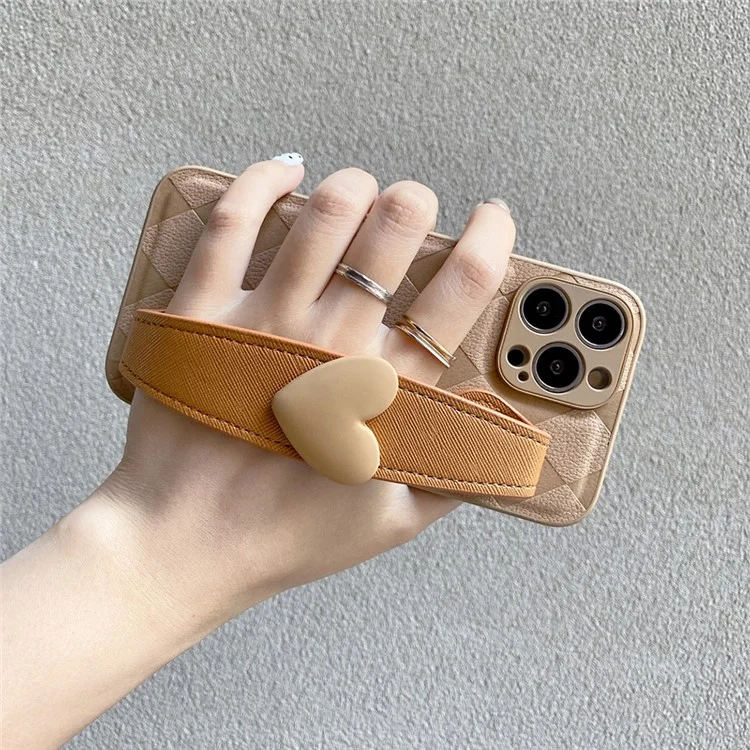 Cellphone Back Shell for iPhone 14 Pro, Rhombus Imprinted PU Leather Coated PC+TPU Phone Cover with Love Heart Wristband