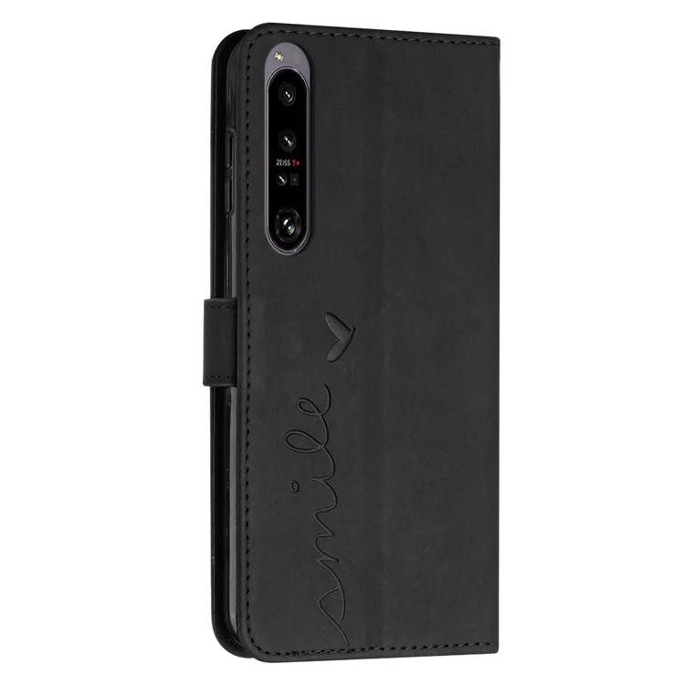 For Sony Xperia 1 IV 5G Anti-fingerprint PU Leather Wallet Phone Case Imprinted Heart Shape Skin-touch Feeling Stand Cover with Strap - Black