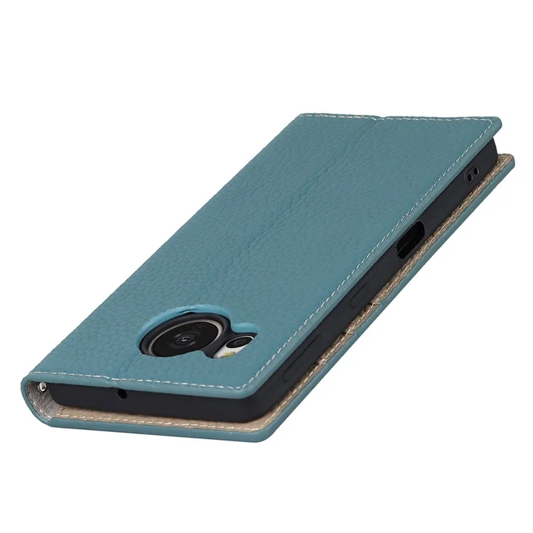 Pour Sharp Aquos Sense 7 Plus Stand Design Téléphone Portable Couvercle Téléphone Portable Anti-Chute Texture Litchi Véritable Étui en Cuir Portefeuille avec Sangle à Main - Bleu Bébé