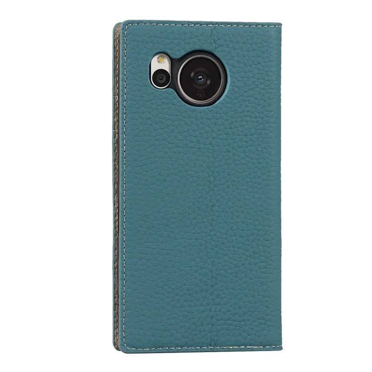 Pour Sharp Aquos Sense 7 Plus Stand Design Téléphone Portable Couvercle Téléphone Portable Anti-Chute Texture Litchi Véritable Étui en Cuir Portefeuille avec Sangle à Main - Bleu Bébé