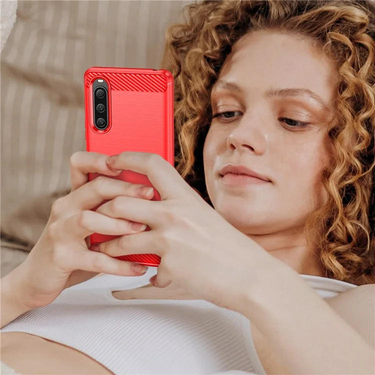 Für Sony Xperia 10 V Soft Carbon Fiber TPU Handyhülle Gebürstet Handyhülle - Rot