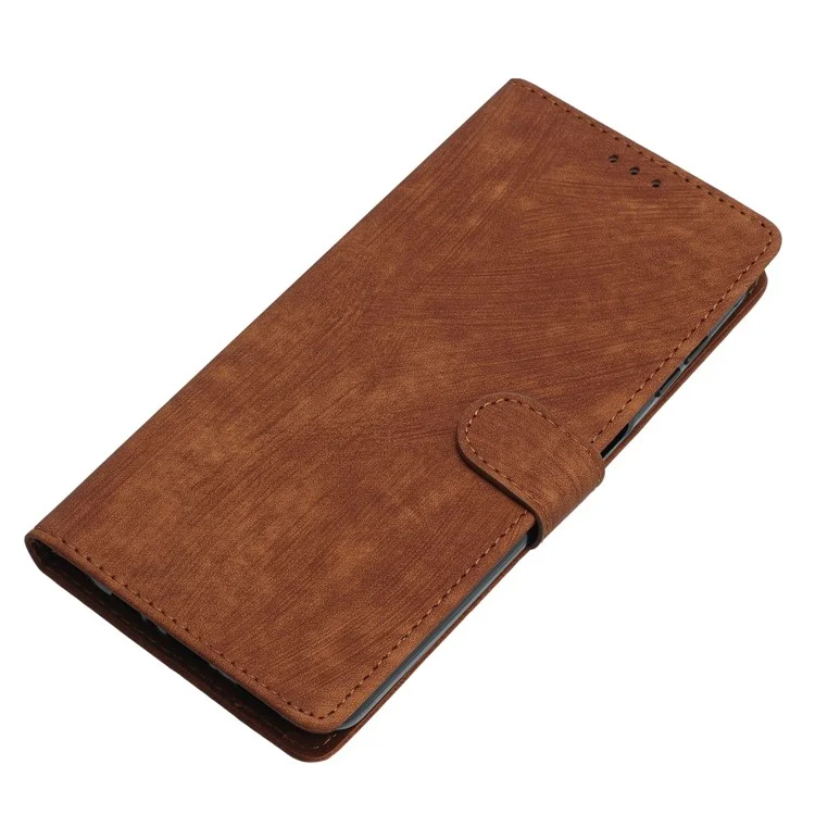 Funda de cuero con textura de piel para iPhone 14 Pro Max, de color sólido, anti-caída y con soporte - Marrón