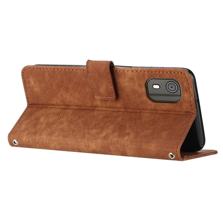 PU Leather Flip Case for Nokia C02 (TA-1522) Skin-touch Stand Imprinted Lines Wallet Phone Cover - Brown