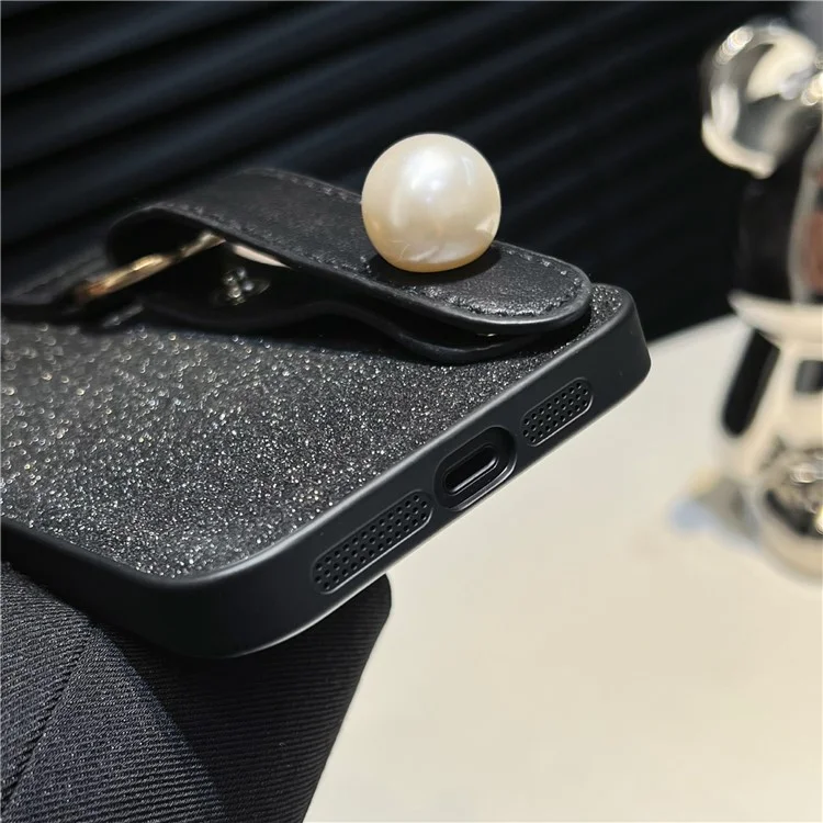 Funda de teléfono de cuero de poliuretano + TPU para iPhone 14 Plus, pulsera con adorno de perlas, protección contra caídas, carcasa negra para teléfono
