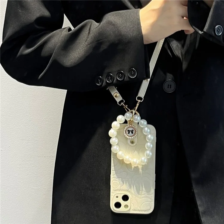 For iPhone 14 Anti-Scratch Cover Camellia Pattern Pearl Chain TPU+PU Leather Phone Case with Shoulder Strap