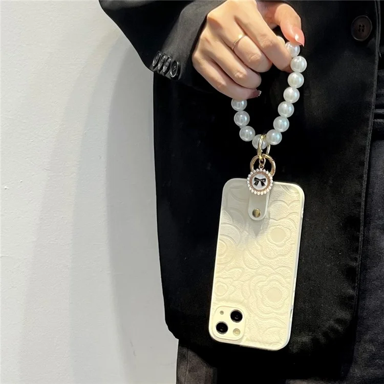 For iPhone 14 Anti-Scratch Cover Camellia Pattern Pearl Chain TPU+PU Leather Phone Case with Shoulder Strap