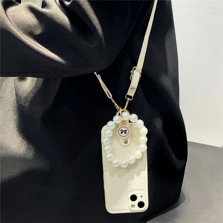 For iPhone 14 Anti-Scratch Cover Camellia Pattern Pearl Chain TPU+PU Leather Phone Case with Shoulder Strap