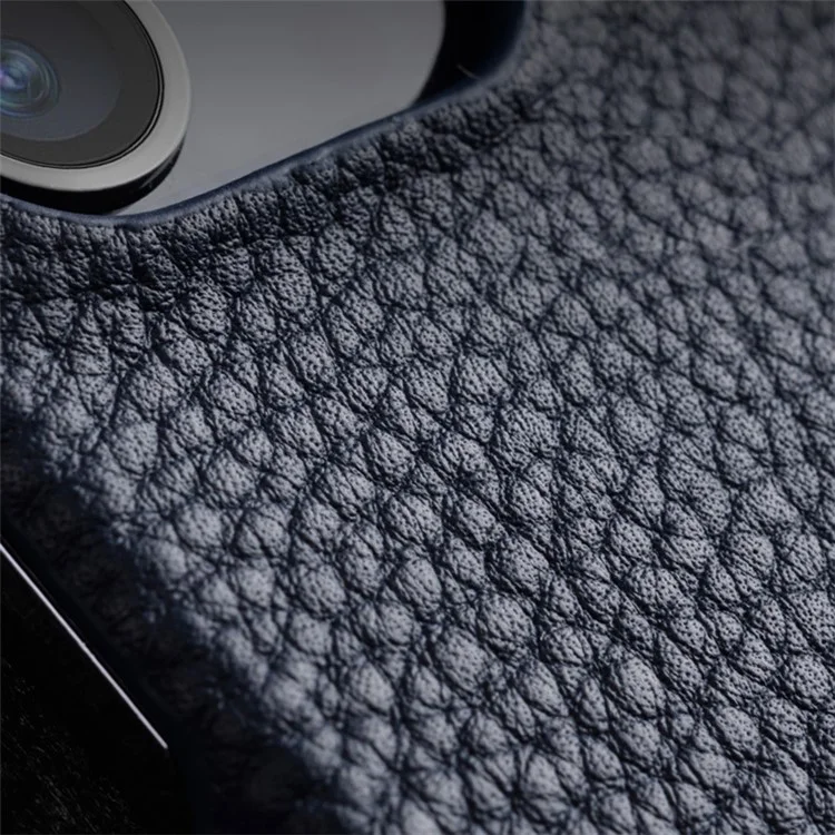 MELKCO для iPhone 14 Pro Genuine Cow Leather Coated PC Phone Case Magnetic Drop-proof Cover - Dark Blue
