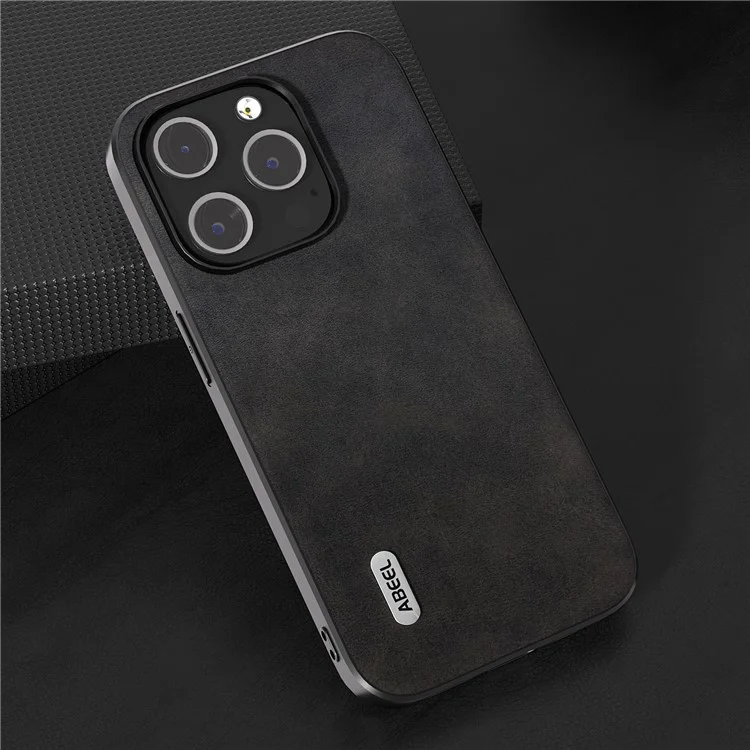 Funda protectora ABEEL para iPhone 15 Pro, de cuero de vaca con textura, revestida de TPU - Negro