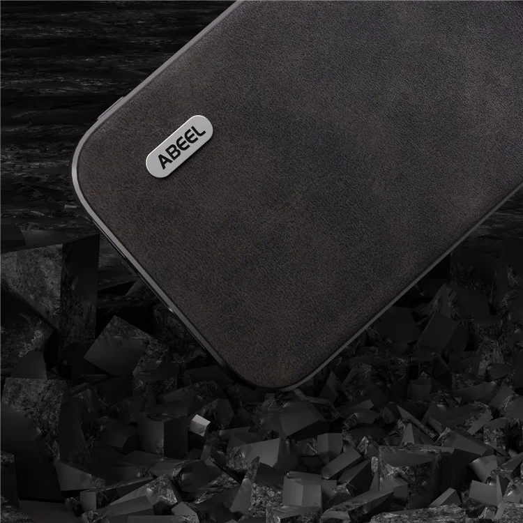Funda protectora ABEEL para iPhone 15 Pro, de cuero de vaca con textura, revestida de TPU - Negro