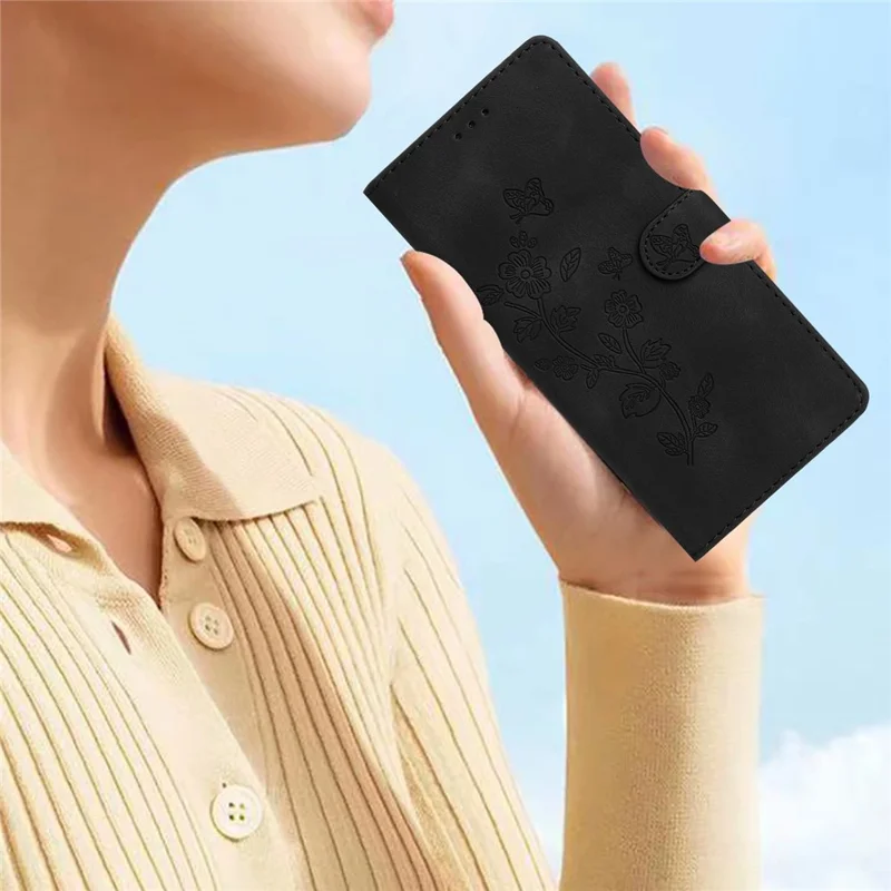 Funda de cartera de cuero con estampado floral para iPhone 15 Pro, a prueba de caídas - Negro