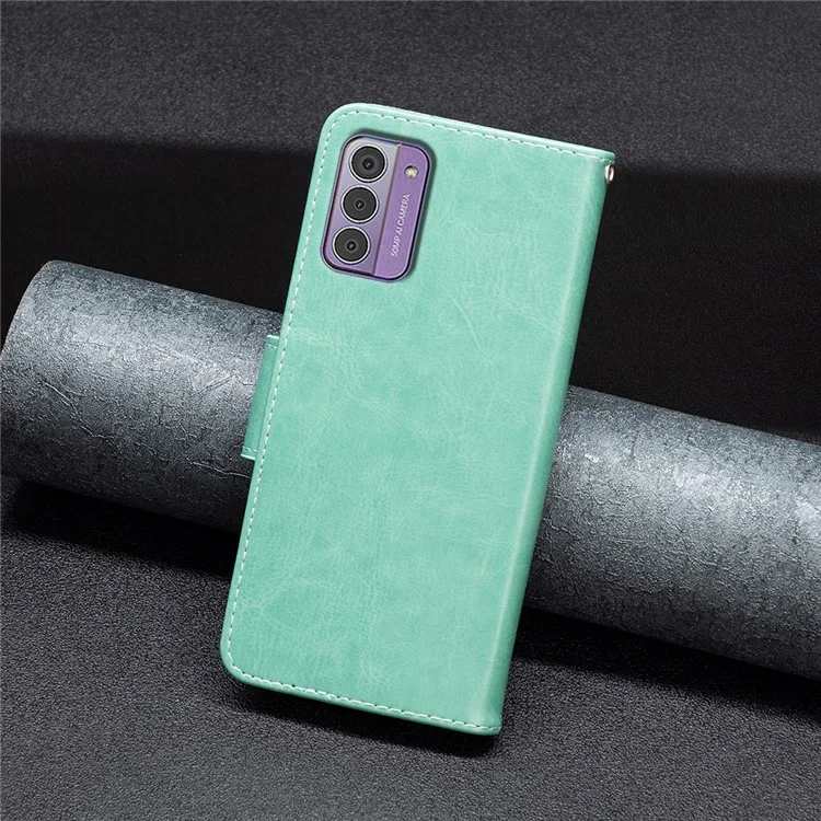Pour Nokia G42 / G310 Butterfly Imprinted Phone Case Leather Stand Wallet Cover with Strap - Green