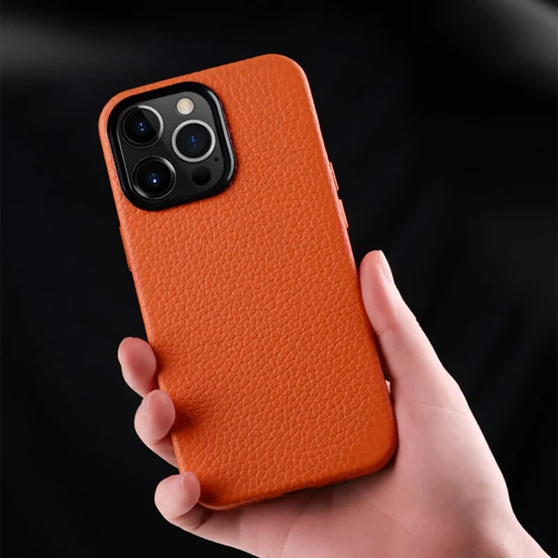 MELKCO For iPhone 15 Pro Max Case Anti-scratch Genuine Cow Leather+PC Magnetic Phone Cover - Orange