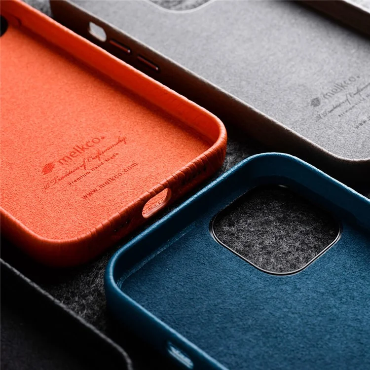 MELKCO Para iPhone 14 Plus Case Magnético Genuíno Couro de Vaca+PC Anti-queda Capa de Telefone - Laranja