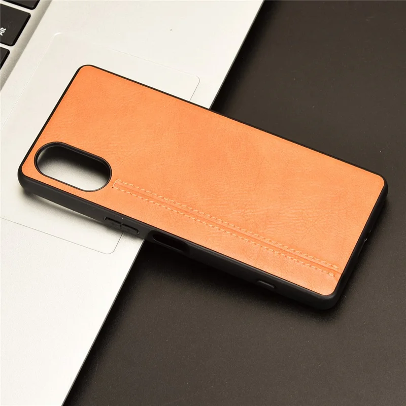 Per Sony Xperia 5 V Custodia in Pelle di Vitello Texture PU Rivestimento in TPU+PC Cover Telefonica - Arancione