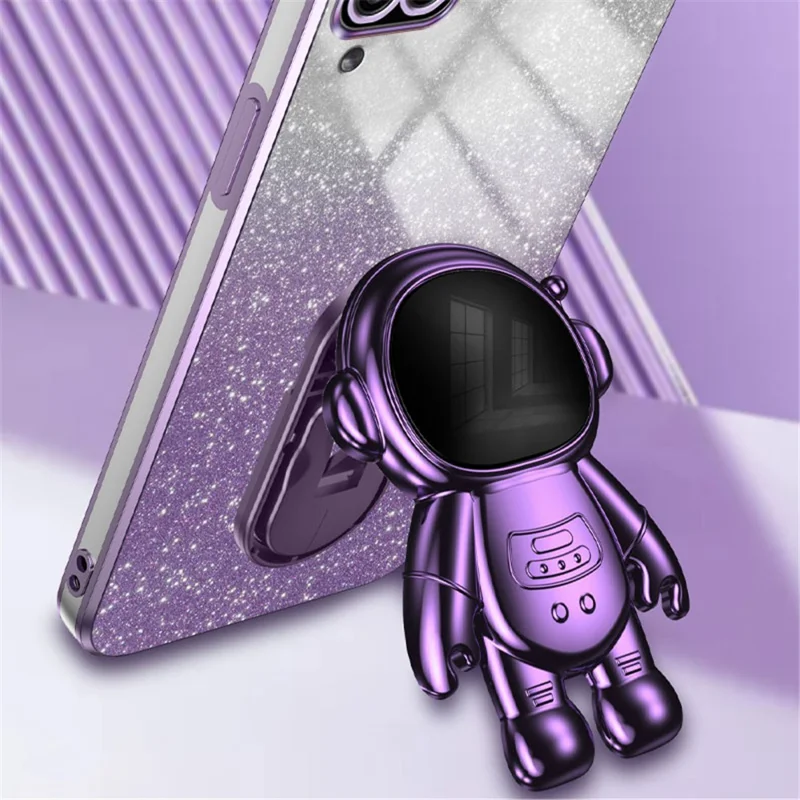 For Samsung Galaxy A12 Case Glitter Powder Astronaut Stand PC+TPU Telefonbeskyttelsesdæksel - Lilla