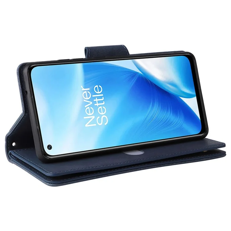 For OnePlus Nord N200 5G Wallet Case Rivet Decor PU Leather Phone Cover with Hand Strap - Blue