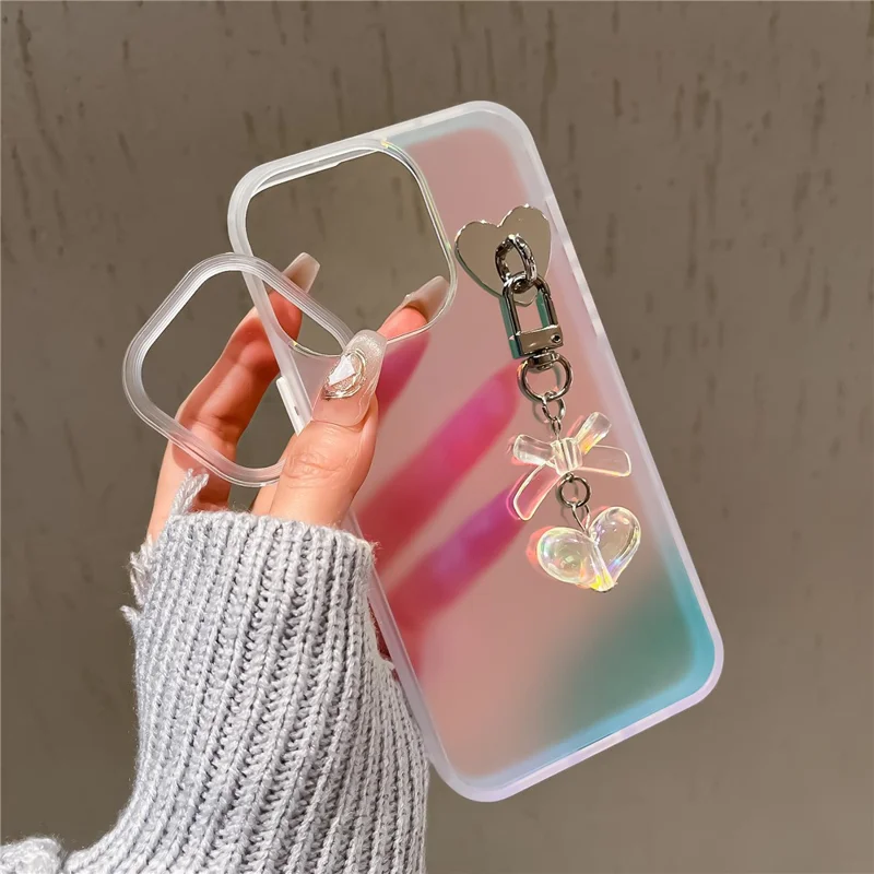 For iPhone 12 / 12 Pro Case Heart Bowknot Pendant PC+TPU Laser Effect Matte Phone Cover - White