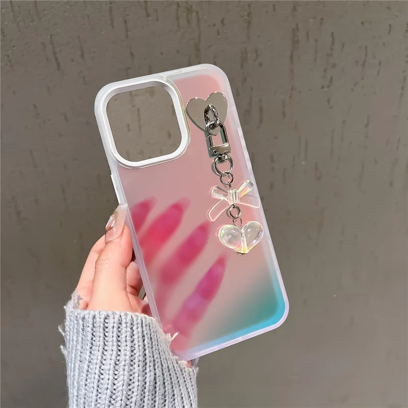 For iPhone 12 / 12 Pro Case Heart Bowknot Pendant PC+TPU Laser Effect Matte Phone Cover - White