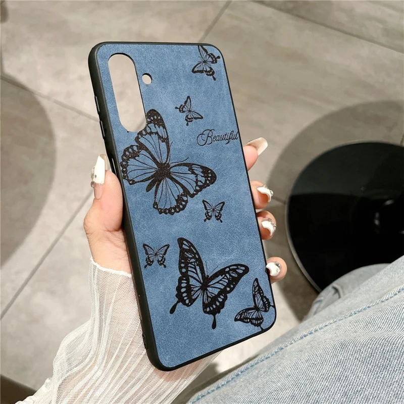 For Samsung Galaxy A04s 4G (164.7 x 76.7 x 9.1 mm) / A13 5G Case Flower Pattern Leather Back Phone Cover - Blue / Butterfly