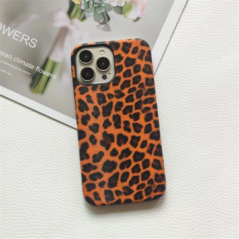 For iPhone 15 Pro Max Leopard Print Phone Case PC+PU Leather Back Cover (Not Complete Covering) - Orange