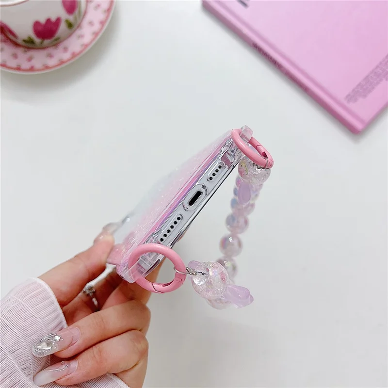 For iPhone 15 Pro Case TPU+Acrylic Gradient Phone Cover with Bowknot Decor Hand Chain - Pink+Green