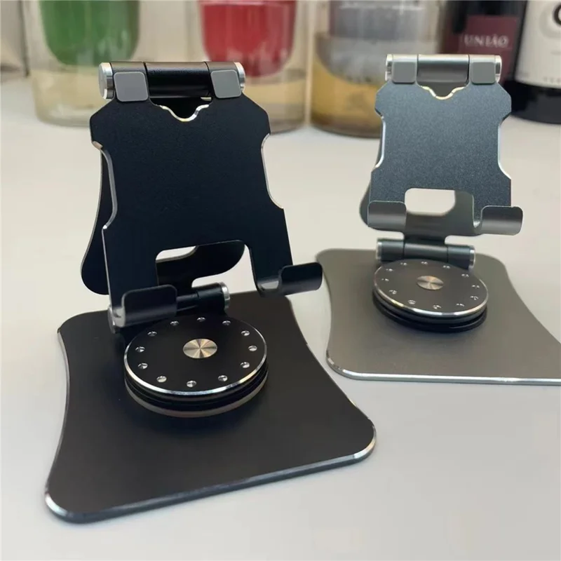 G63 Desktop Mini Folding Cell Phone Stand for iPhone 16 / 16 Plus / 16 Pro / 16 Pro Max 360-Degree Rotating Portable Metal Phone Holder - Red