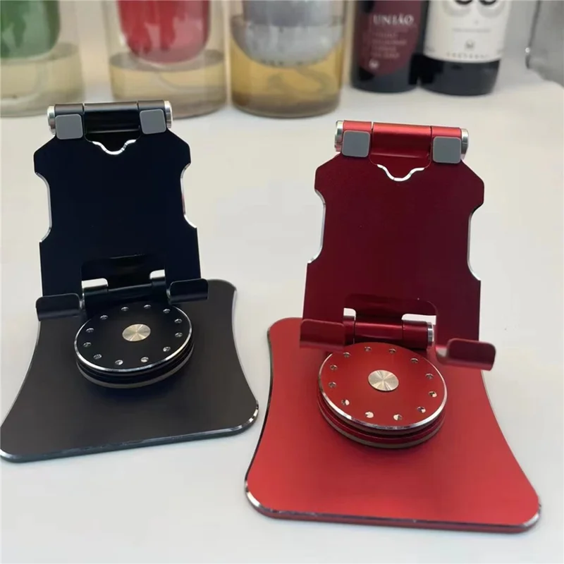 G63 Desktop Mini Folding Cell Phone Stand for iPhone 16 / 16 Plus / 16 Pro / 16 Pro Max 360-Degree Rotating Portable Metal Phone Holder - Red