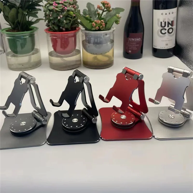 G63 Desktop Mini Folding Cell Phone Stand for iPhone 16 / 16 Plus / 16 Pro / 16 Pro Max 360-Degree Rotating Portable Metal Phone Holder - Red
