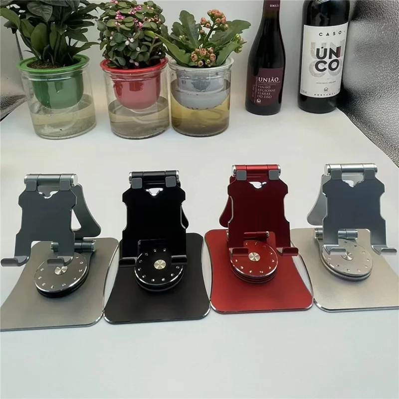 G63 Desktop Mini Folding Cell Phone Stand for iPhone 16 / 16 Plus / 16 Pro / 16 Pro Max 360-Degree Rotating Portable Metal Phone Holder - Red