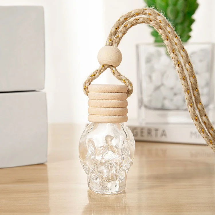 GJ-539 8ml Skull Shape Shape Vidro Transparente Garrafa de Perfume Vazio Com Pingente de Carro de Madeira