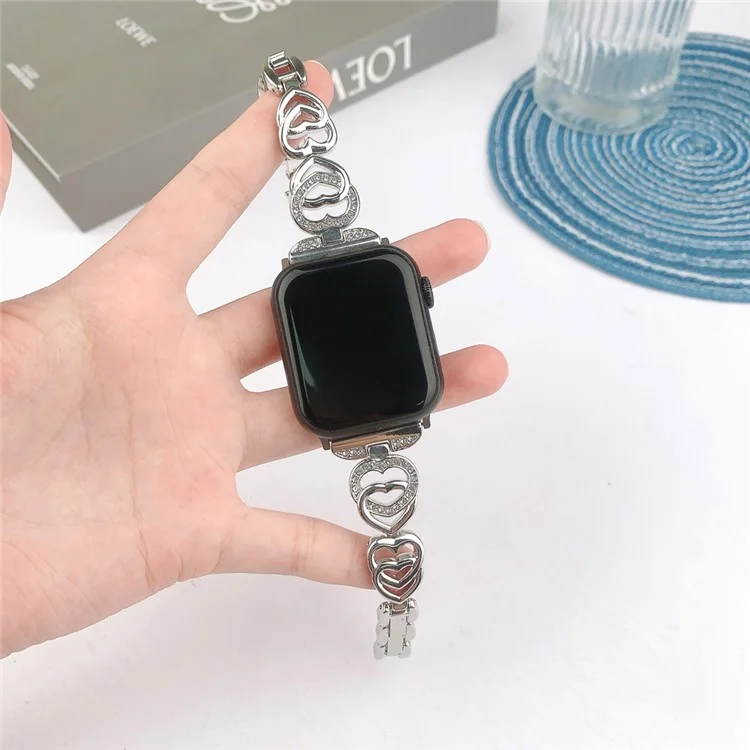 Für Apple Watch 10 46mm / Ultra 2 / Ultra 49mm / 9 8 7 45mm / SE (2023) SE (2022) SE 6 5 4 44mm / 3 2 1 42mm Herz Design Zinklegierung Uhrenarmband - Silber