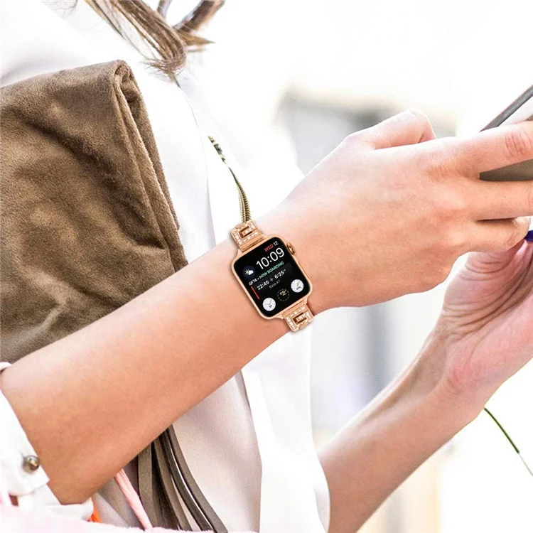 Correa para Apple Watch Series 10 46mm / Ultra 2 / Ultra 49mm / 9 8 7 45mm / SE (2023) SE (2022) SE 6 5 4 44mm / 3 2 1 42mm Banda con Forma de G con Strass - Oro Rosa