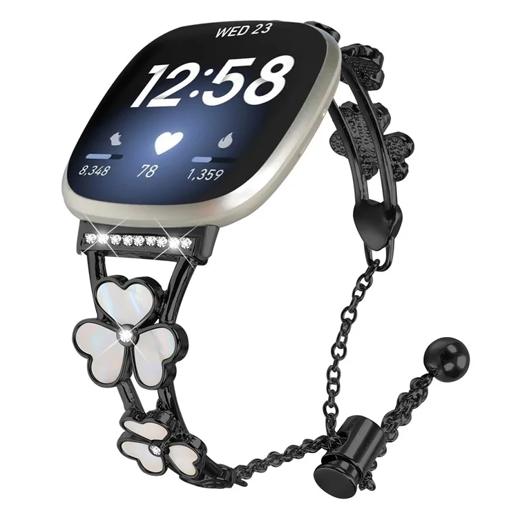 Correa de reloj de metal de aleación de zinc con adorno de trébol para Fitbit Versa 4 / Sense 2 - Negro