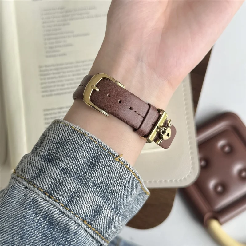 Wrist Strap for Apple Watch Series 10 9 8 7 SE 6 5 4 3 2 1 42mm 41mm 40mm 38mm Heart Pendant Leather Watch Band - Coffee / Gold Buckle