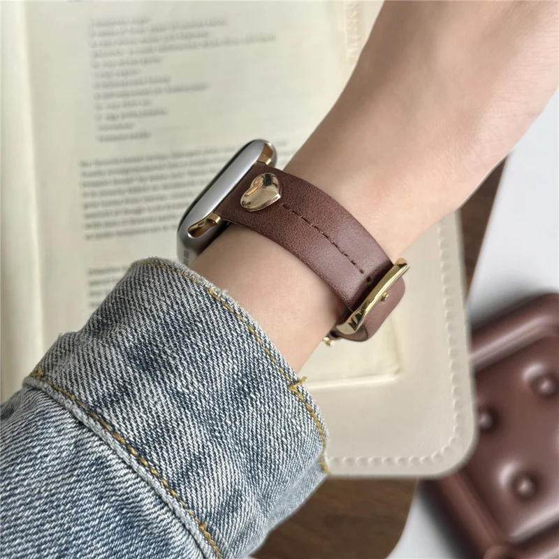 Wrist Strap for Apple Watch Series 10 9 8 7 SE 6 5 4 3 2 1 42mm 41mm 40mm 38mm Heart Pendant Leather Watch Band - Coffee / Gold Buckle