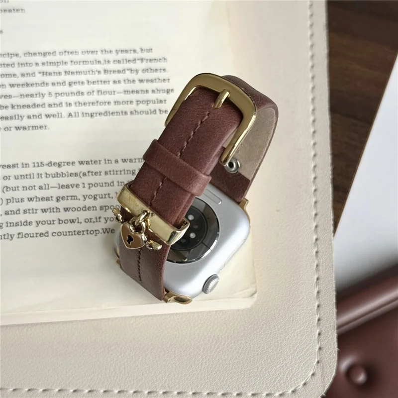 Wrist Strap for Apple Watch Series 10 9 8 7 SE 6 5 4 3 2 1 42mm 41mm 40mm 38mm Heart Pendant Leather Watch Band - Coffee / Gold Buckle