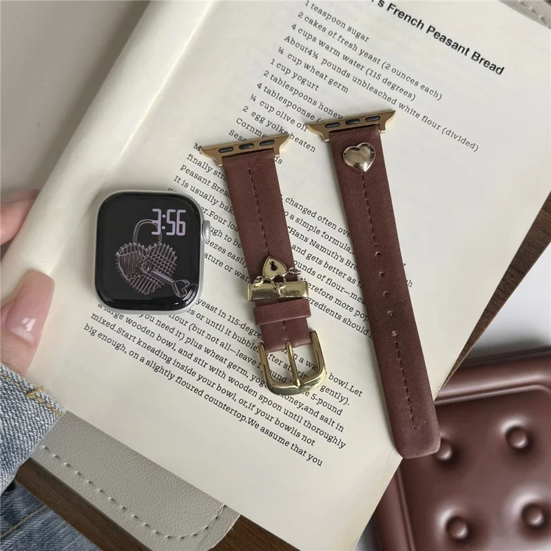 Wrist Strap for Apple Watch Series 10 9 8 7 SE 6 5 4 3 2 1 42mm 41mm 40mm 38mm Heart Pendant Leather Watch Band - Coffee / Gold Buckle