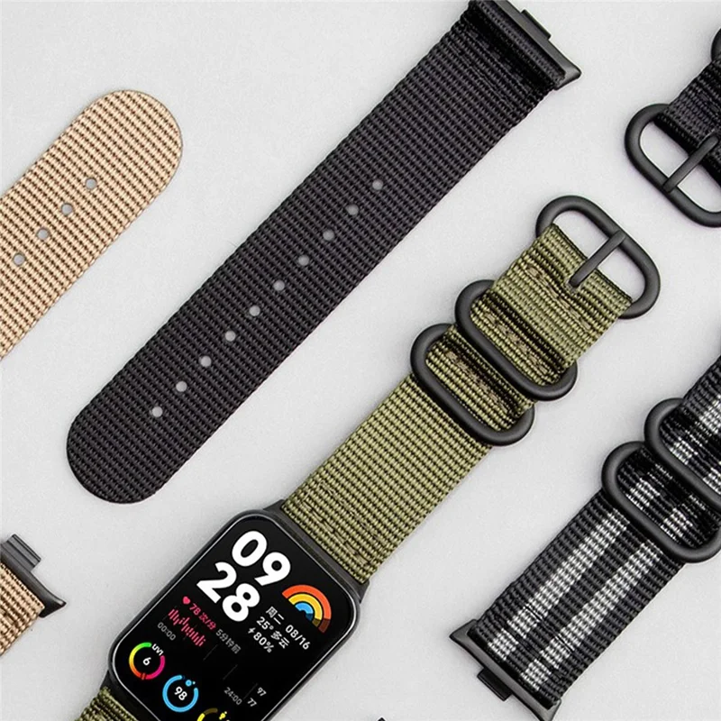 Cinturino in Nylon a Doppio Giro per Xiaomi Redmi Watch 6 / 5 / 4 / Smart Band 9 Pro / 8 Pro Fibbia Nera Cinturino Intrecciato - Verde Militare