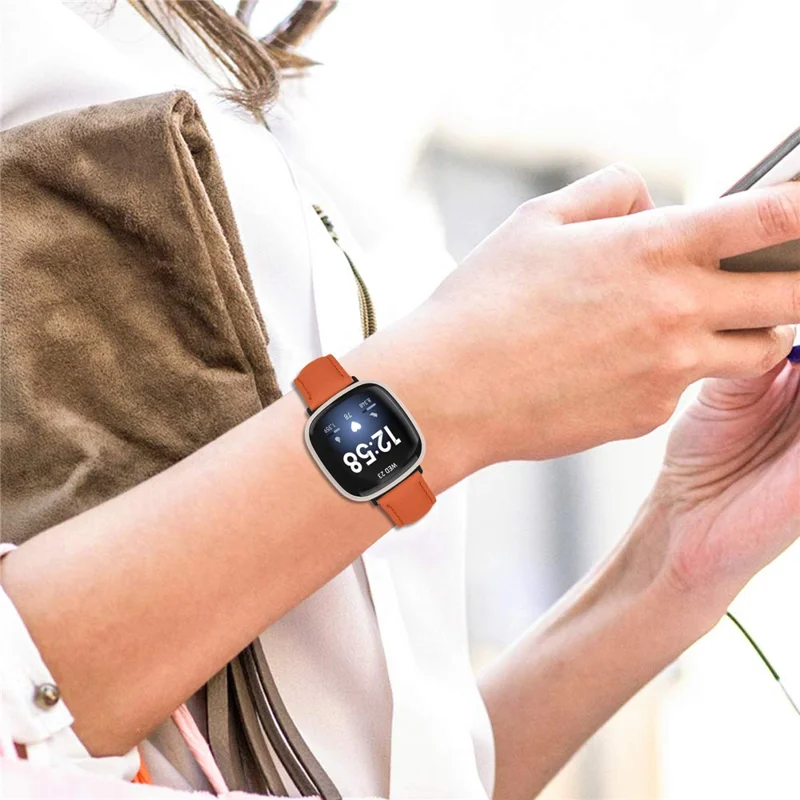 Litchi Textured Genuine Cow Leather Strap with Electroplated Buckle for Fitbit Versa 4  /  Sense 2 Pointed-End Watch Band - Orange / Black
