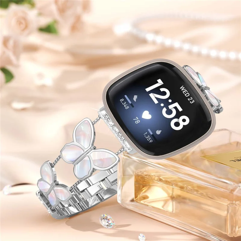 Watch Band for 	Fitbit Versa 4 / Versa 3 / Sense 2 , Butterfly Rhinestone Decor Metal Chain Wrist Strap - Silver