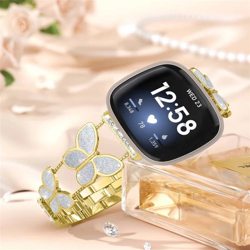 Watch Band for Fitbit Versa 4 / Versa 3 / Sense 2 , Butterfly Rhinestone Decor Electroplated Alloy Strap - Gold / Glitter Shell