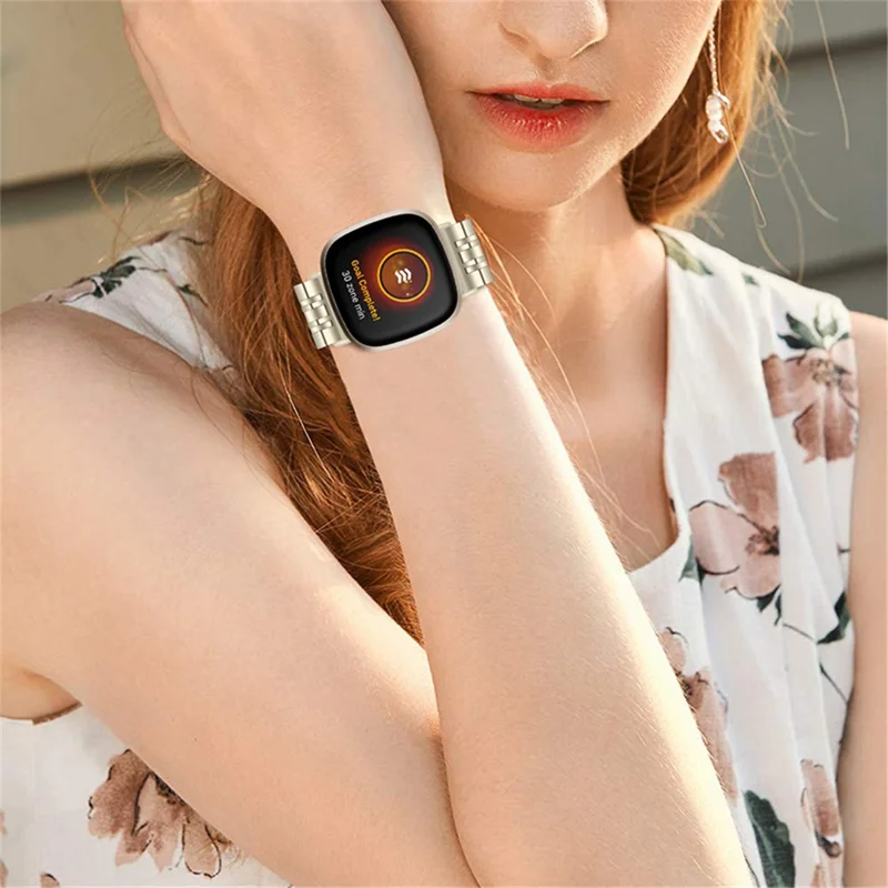 Ersetzbares Edelstahl-Armband mit modischem 7-Perlen-Design für Fitbit Sense/Versa 3 - Champagner Gold