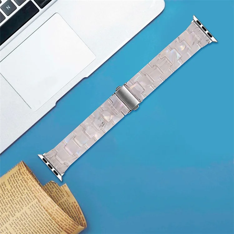 Per Apple Watch Series 10 42mm / 9 8 7 41mm / 6 5 4 SE SE (2022) SE (2023) 40mm / 3 2 1 38mm Cinturino in resina con fibbia in acciaio inossidabile - Conchiglia bianca
