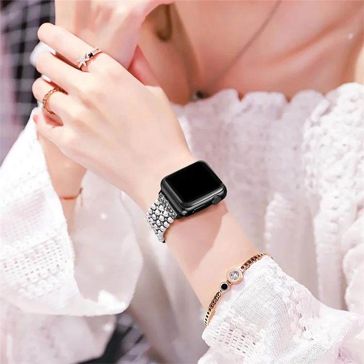 For Apple Watch Series 10 42mm / 9 8 7 41mm / 6 5 4 SE SE (2022) SE (2023) 40mm / 3 2 1 38mm Fashionable Pearls Rhinestone Decor Bracelet Metal Watch Band Replacement Wrist Strap - Black
