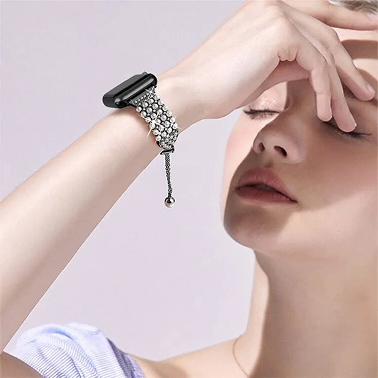For Apple Watch Series 10 42mm / 9 8 7 41mm / 6 5 4 SE SE (2022) SE (2023) 40mm / 3 2 1 38mm Fashionable Pearls Rhinestone Decor Bracelet Metal Watch Band Replacement Wrist Strap - Black