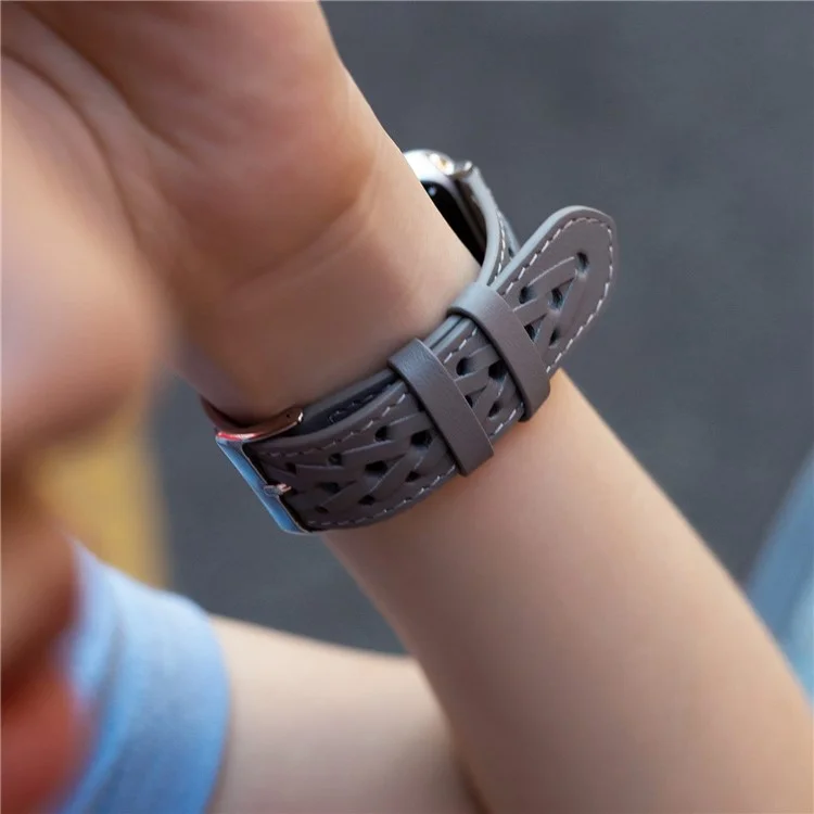 Para Apple Watch Series 7 45 mm / Serie 6 / 5 / 4 / SE 44 mm / Serie 1 / 2 / 3 42 mm Hollow-out Woven Watch Strap Genuine Leather en Forma de Vista de Muñeca en Forma de v - Gris