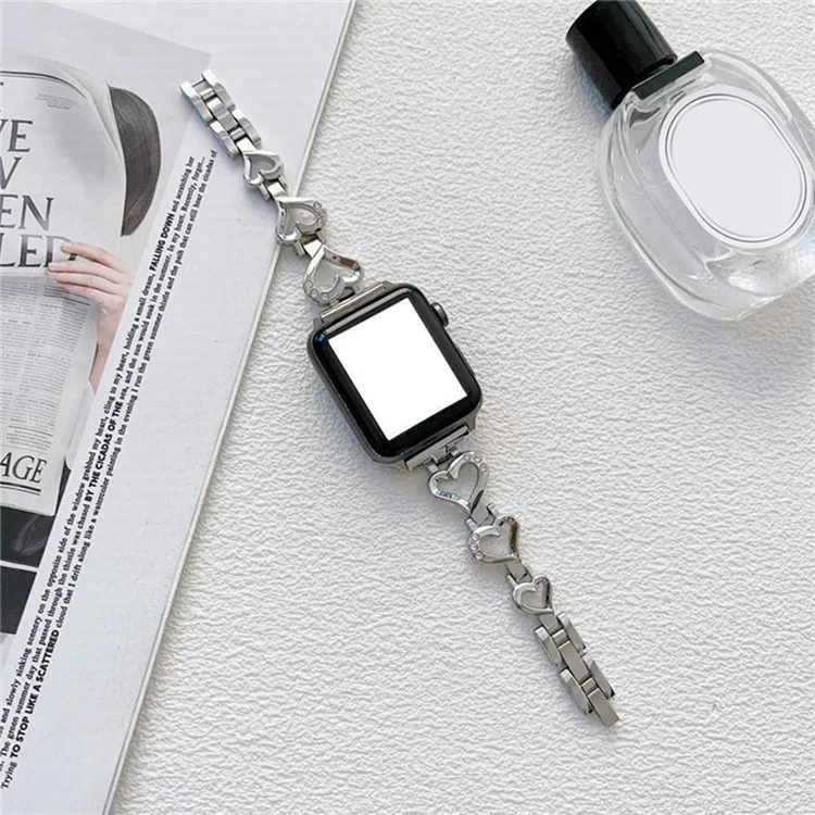 Para Apple Watch Series 10 42mm / 9 8 7 41mm / 6 5 4 SE SE (2022) SE (2023) 40mm / 3 2 1 38mm Metal Heart Rhinestone Decor Smart Watch Band Bracelet Wrist Strap - Silver